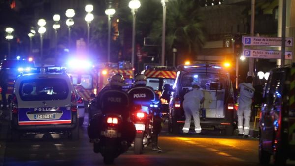 Rescue workers arrive on the scene after the deadly attack on Bastille Day revelers in Nice, France. (AFP/Valery Hache)