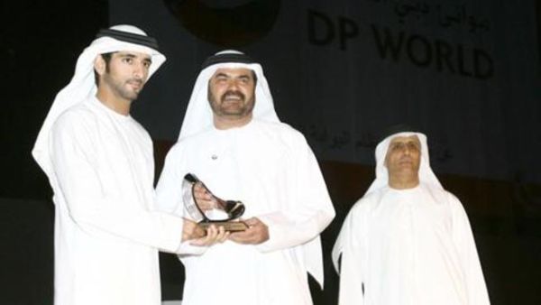 Mohammed Al Muallem, Senior Vice President and Managing Director, DP World, recieving the award from Sheikh Hamdan bin Mohammed bin Rashid Al Maktoum, Crown Prince of Dubai