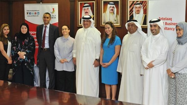 Shaikh Mohammad Bin Essa Al Khalifa and Dr. Zakaria Hejres and representative from both parties during the signing ceremony