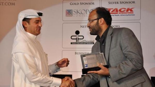 Bin Turkeya, SVP Human Resources, Economic Zones World receiving the GCC Excellence Award