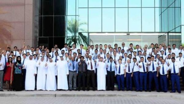 Honorees in a group picture with Dr. Rahma bin Mohamed Al Shamsi in presence of Abdullah Hassan Al Noman