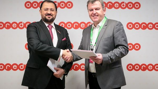 Waleed Al Sayed-CEO Ooredoo Qatar and Chris Dedicoat-EVP Worldwide Sales Cisco at MWC