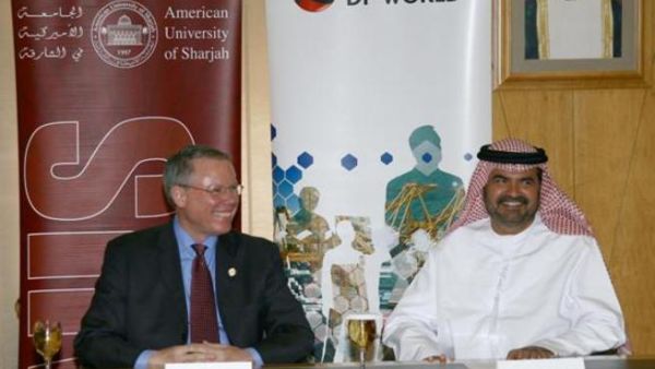 Mohammed Al Muallem and Dr. Peter Heath at the signing ceremony Mohammed Al Muallem and Dr. Peter Heath at the signing ceremony