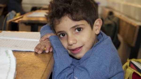 A Child in Zarqa Elementary and Preparatory School for Boys A Child in Zarqa Elementary and Preparatory School for Boys