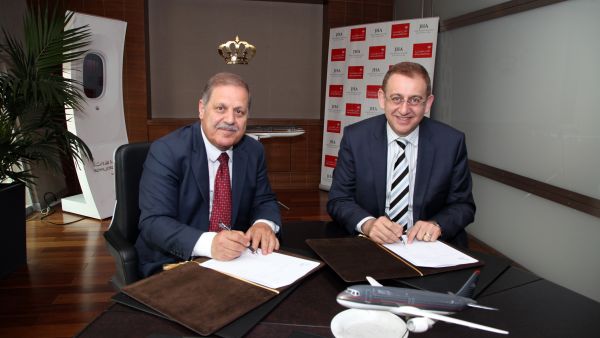 Abu Faris (left) and Captain Misto signing the MoU Abu Faris (left) and Captain Misto signing the MoU