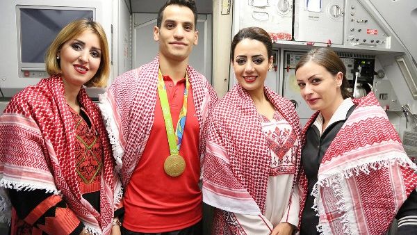 RJ staff delighted to accompany gold medalist Abu Ghoush on Paris-Amman flight