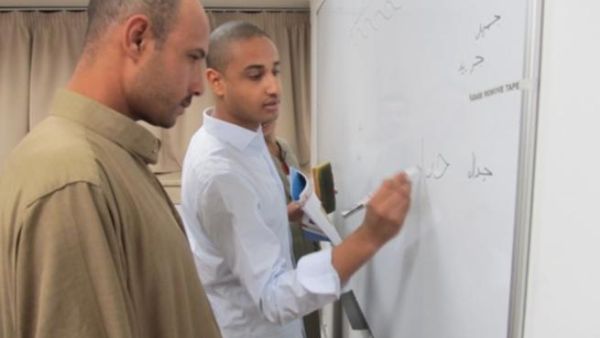 Ahmed Ali leads a class Ahmed Ali leads a class