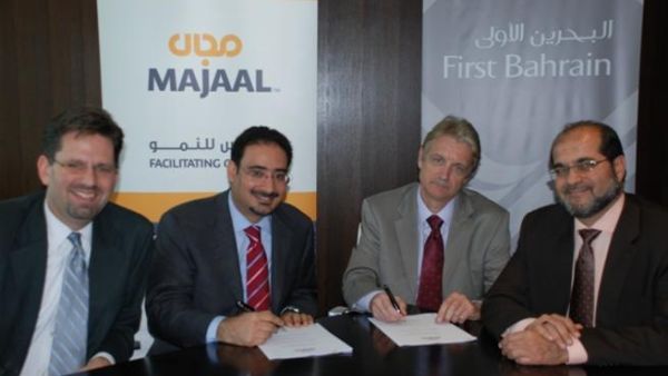 Amin Al Arrayed, General Manager of First Bahrain; Mr. Peter Makepeace, General Manager of Baker Wilkins &amp;amp; Smith Middle East; Daniel Taylor Head of Operations First Bahrain; and Yasser Abu-Lughod Head of Development First Bahrain