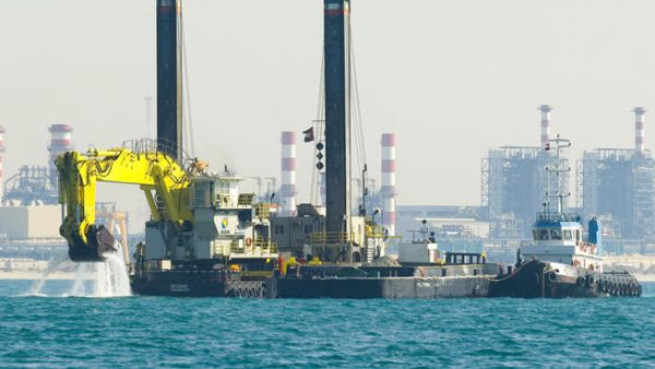 An Abu Dhabi Ports Company dredger at work off the Emirate's shoreline