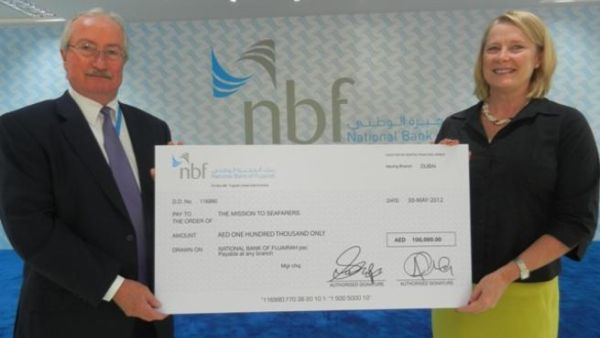 Alan Maitland Smith, Chairman of NBF’s CSR Committee handing over the cheque to Angel Appeal in support of seafarers off the coast of Fujairah