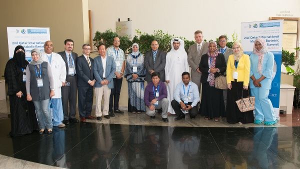 Dr. Moataz Bashah with some of the speakers and participants at the summit