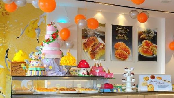 For one month, the assorted array of breads, buns and cakes are at reduced prices For one month, the assorted array of breads, buns and cakes are at reduced prices