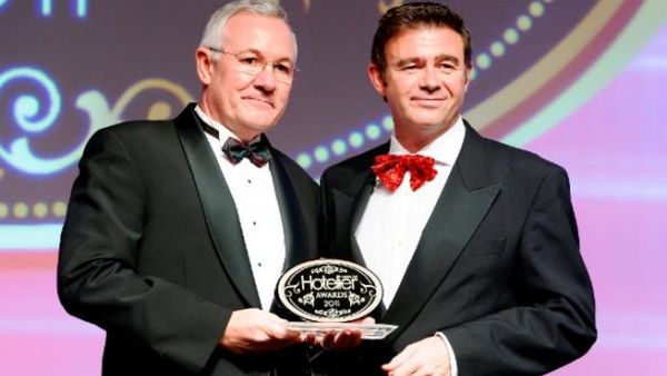 Bruno Huber, General Manager of Mövenpick Resort & Spa Dead Sea and Regional Manager Jordan receives the award as Green Hotelier of the Year
