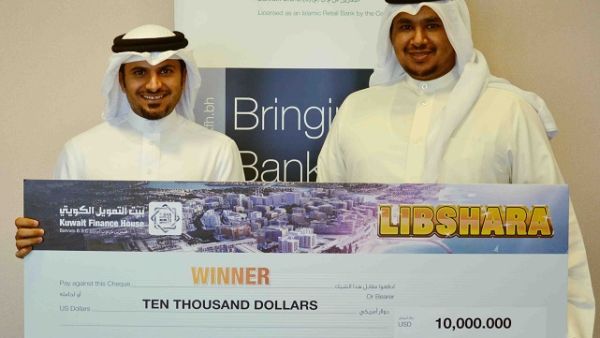 Mr. Subah Al Zayani with the winner of USD 10,000 Mr. Isa AlKaabi