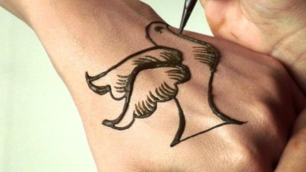 The dove represents the wish for a quiet peace during the heat of battle The dove represents the wish for a quiet peace during the heat of battle