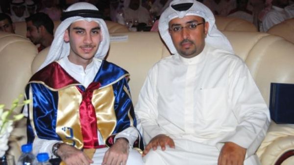 Talal Al Shgeih, who ranked first amongst Kuwaiti students, and Fahad Al Reshaid, Public Relations Manager at Burgan Bank