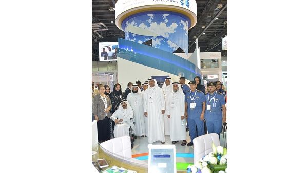 Ahmed Mahboob Musabih flanged by a number of Customs staff at DC stand at DIGAE 2016