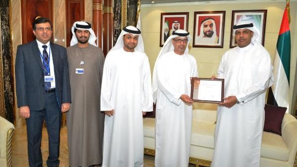 Juma Al Ghaith presents Ahmed Mahboob Musabih with the COBIT 5 certificate, in presence of Ahmad Al Yaqoobi, Project Delivery Director and Adel Al Hosani, Head of Information Security Juma Al Ghaith presents Ahmed Mahboob Musabih with the COBIT 5 certificate, in presence of Ahmad Al Yaqoobi, Project Delivery Director and Adel Al Hosani, Head of Information Security
