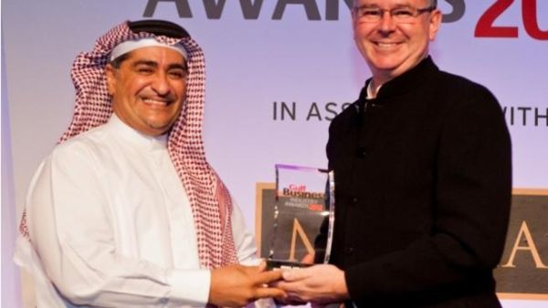 David Butorac, CEO of OSN receiving the awards for OSN