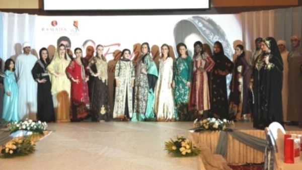 Designer Hoorin Mumtaz with the models