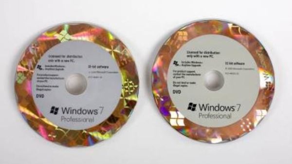 Discs of counterfeit and genuine Microsoft Windows 7 Professional