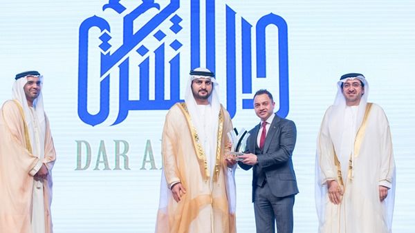 Dr. Adnan Chilwan, Group CEO at Dubai Islamic Bank, receives the award from HH Deputy Ruler of Dubai