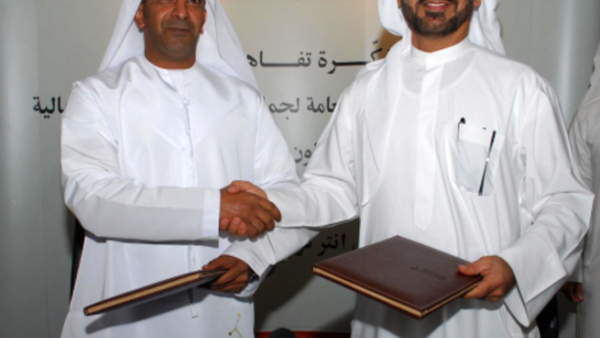 Ahmed Butti Ahmed, Director General of Dubai Customs and CEO of the Ports, Maritime shaking hands with Free Zone Authority and HE Saeed Ahmed Al Muhairi, Director General of Abu Dhabi Customs Ahmed Butti Ahmed, Director General of Dubai Customs and CEO of the Ports, Maritime shaking hands with Free Zone Authority and HE Saeed Ahmed Al Muhairi, Director General of Abu Dhabi Customs