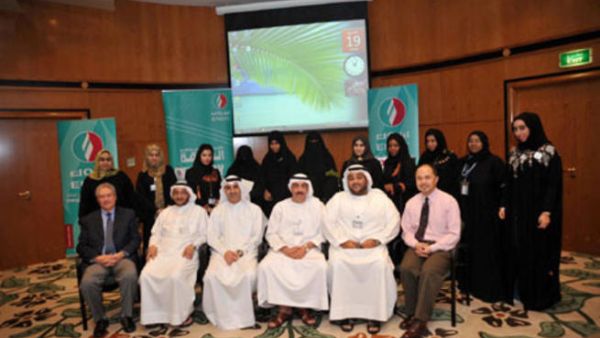 The trainees with members from ENOC management during the graduation ceremony 