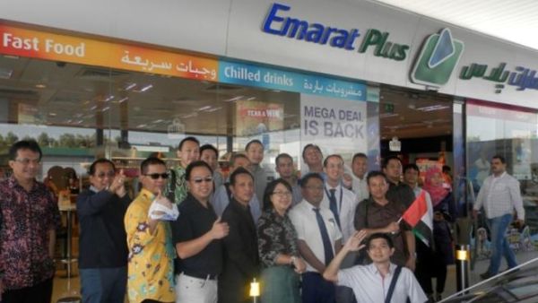 Delegation in front of one of the Convenience Stores Delegation in front of one of the Convenience Stores