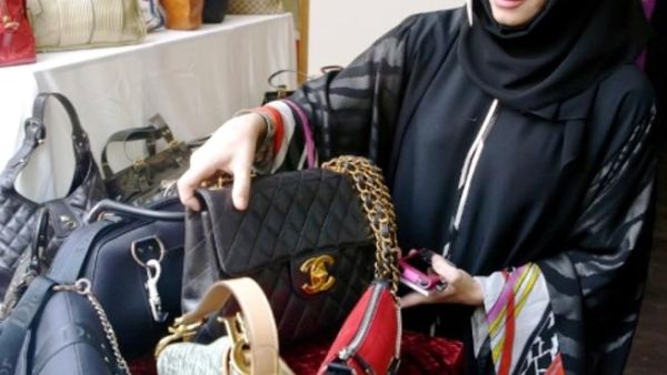 Eman Al Mansoori, Marketing Manager at Dubai Ladies Club with a selection of designer bags in 2010 Eman Al Mansoori, Marketing Manager at Dubai Ladies Club with a selection of designer bags in 2010