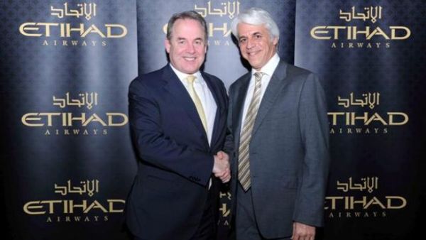 James Hogan, CEO, Etihad Airways and Michel Taride, President Hertz International, Executive Vice President, Hertz Corporation celebrate the new global partnership