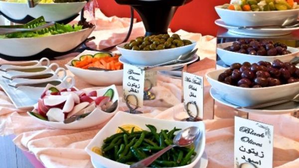 Made to look like an authentic Arabic place, Al Bustan's restaurant features several seating areas and tables perfect for spending an evening with family and friends