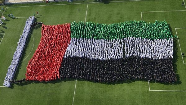 The students, from GEMS Cambridge International School - Abu Dhabi, and GEMS United Indian School, were all dressed in the National flag colors, creating an image of the country’s flag waving. The students, from GEMS Cambridge International School - Abu Dhabi, and GEMS United Indian School, were all dressed in the National flag colors, creating an image of the country’s flag waving.
