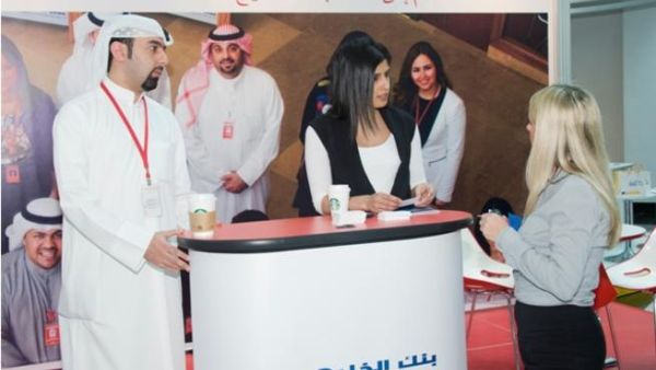 A member of the Gulf Bank team explaining the application process A member of the Gulf Bank team explaining the application process