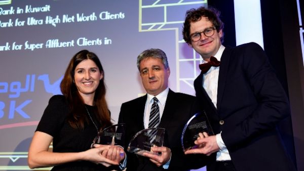 Malek Khalife, NBK's General Manager, Private Banking Group receiving the three awards from Euromoney Malek Khalife, NBK's General Manager, Private Banking Group receiving the three awards from Euromoney