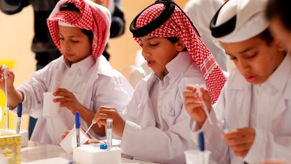 Children take part in a specially-designed national day experiment in Qatar Foundation’s Darb El-Saai tent