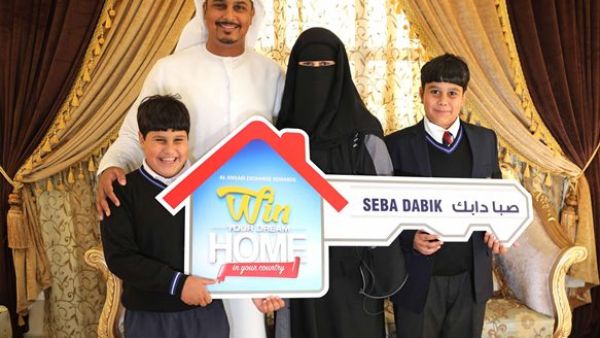 Seba Dabik, winner of the Grand Prize, with her family