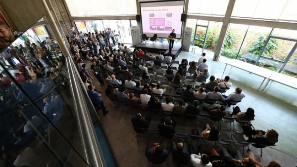 Unique opportunities. Participants attend a conference during the international TechCrunch Startup Battlefield in Beirut’s Digital District. (TechCrunch)
