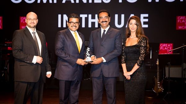 UAE Exchange CEO Promoth Manghat (left) and UAE Exchange President Y Sudhir Kumar Shetty (right) recieving the Great Place to Work Award UAE Exchange CEO Promoth Manghat (left) and UAE Exchange President Y Sudhir Kumar Shetty (right) recieving the Great Place to Work Award