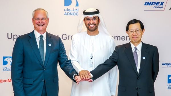 Sultan Ahmed Al Jaber, UAE Minister of State and Group CEO of ADNOC, with Darren W. Woods, Chairman and Chief Executive Officer of Exxon Mobil Corporation and Toshiaki Kitamura, President and Chief Executive Officer of INPEX, after the signing ceremony. Sultan Ahmed Al Jaber, UAE Minister of State and Group CEO of ADNOC, with Darren W. Woods, Chairman and Chief Executive Officer of Exxon Mobil Corporation and Toshiaki Kitamura, President and Chief Executive Officer of INPEX, after the signing ceremony.