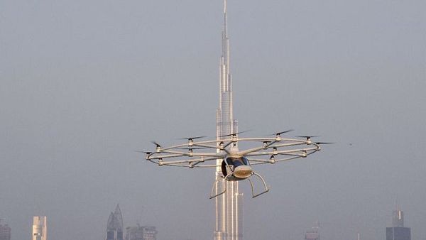 A video shows the flying taxi whirring through the sky before returning to base. (Gulf Business)