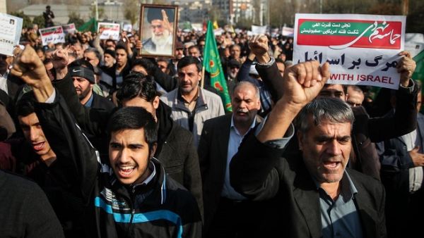 In its latest report, the Iranian Parliament Research Center put the country’s economic growth in the current year at 4.1 percent. (AFP)