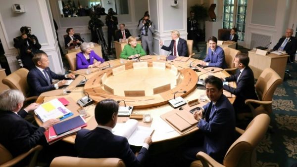 After the U.S. president hit European allies with aluminum and steel tariffs, the meeting shows a Washington policy drifting away from European commitments. (AFP)