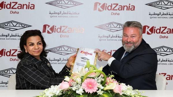 خلال توقبع الإتفاقية على إنشاء منطقة لمكتبة قطر الوطنية داخل مدينة كيدزانيا الدوحة.