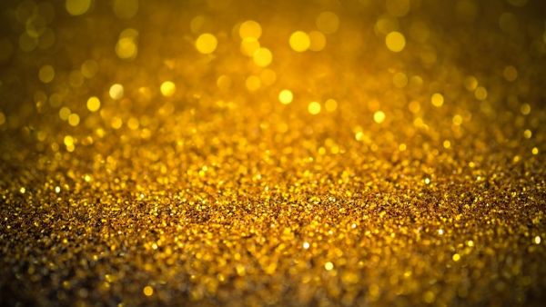 هبط الذهب في السوق الفورية 0.4% إلى 1206.39 دولار للأونصة.