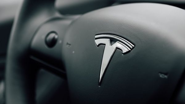 Shares plunged following the announcement, which also signaled a tough profit road ahead for Tesla. (Shutterstock)