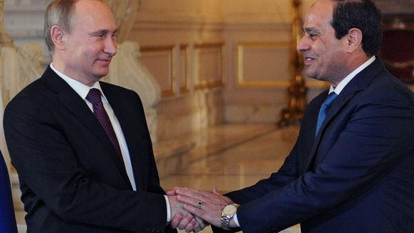 Egyptian President Abdel-Fattah el-Sisi shakes hands with his Russian counterpart Vladimir Putin during their meeting in Cairo on February 10. (AFP)