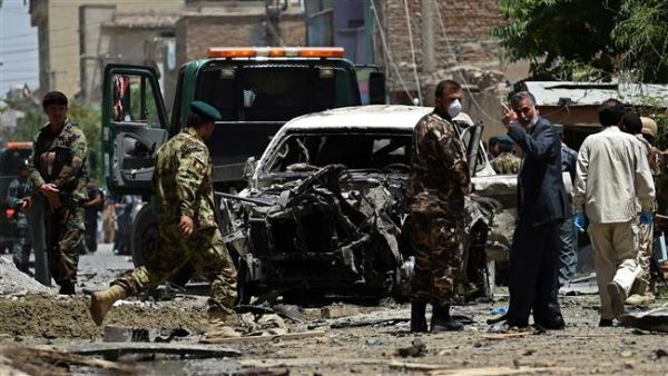 Afghan officials examine the remains of roadside bombing from a suicide attack in Kabul earlier this year. (AFP/File)