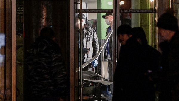 The bomb had been hidden in a locker where shoppers leave their belongings in a branch of the Perekrestok supermarket chain, according to local reports. Pictured above, investigators evaluate the scene. (AFP) 
