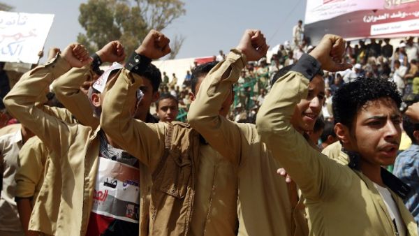 Yemenis gather in a stadium to demonstrate in solidarity with the governorate of Taez, on March 20, 2016, in the Yemeni capital Sanaa. (AFP/Mohammed Huwais)